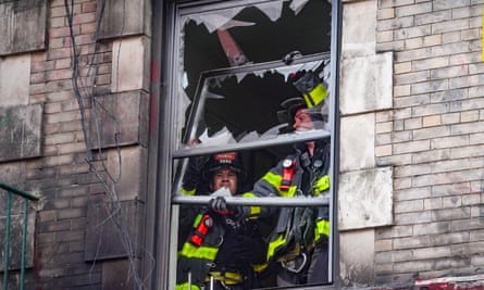 Firefighters removed windows from the six-story building as a result of this week's blaze.