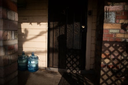 Bottled water on a front porch in Tombstone Territory, an unincorporated working class neighborhood 20 minutes south east of Fresno, California, February 21st, 2020.