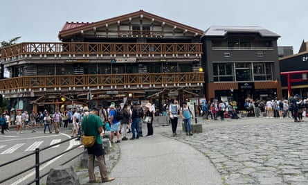 Crowds in front of a restaurant and souvenir shop at the fifth stage of Mount Fuji.