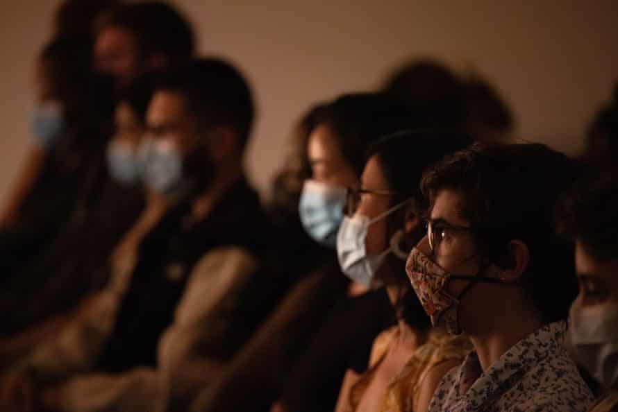The audience watches on