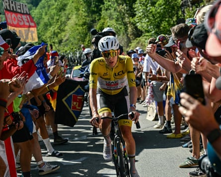 Tadej Pogacar chases down nan lead breakaway group connected nan Alpe d'Huez ascent.