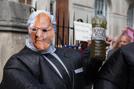 A Foil Vedanta campaigner masked as Anil Agarwal, Vedanta’s founder and chairman, protests outside the firm’s 2017 annual general meeting in London