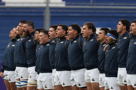 Argentina’s players sing their national anthem before facing Wales in San Juan, Argentina