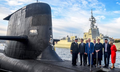 France’s Emmanuel Macron (second left) and the then Australian PM, Malcolm Turnbull (centre) on the deck of an Australian navy submarine in Sydney in 2018
