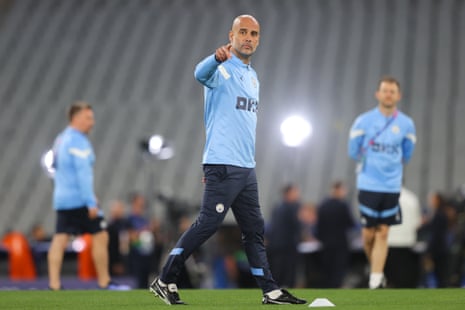Pep Guardiola points the way during yesterday’s pre-final training session.