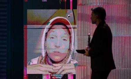 Vicky Krieps is seen on a display via an online video transmission after winning best actress.