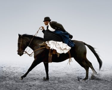 A woman dressed in 19th century clothing riding a black horse against a pale, misty background.