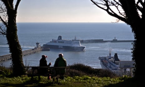 A ferry arrives at Dover, where plans for a customs clearance park have been downgraded.