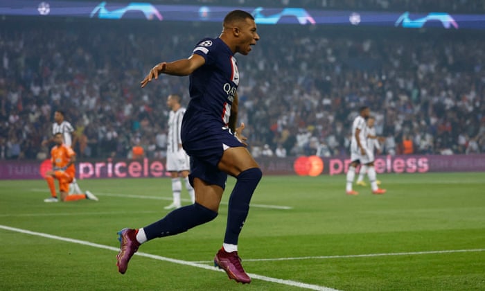 Paris St Germain's Kylian Mbappe celebrates after opening the scoring.