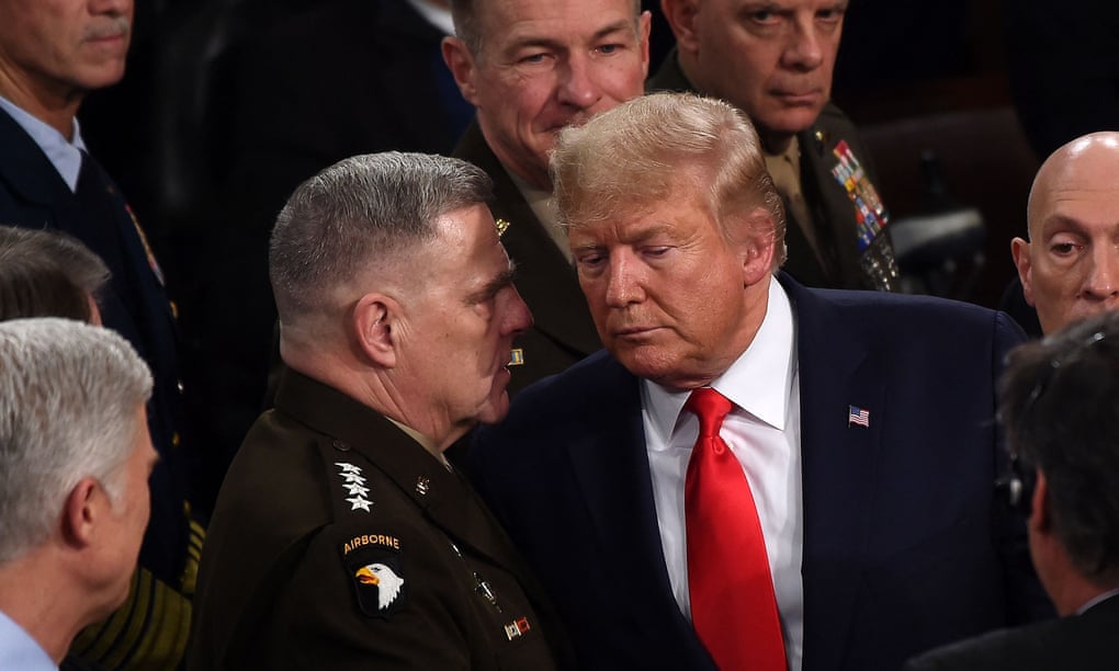 Gen Mark Milley talks to Donald Trump after the State of the Union address at the US Capitol in Washington in February 2020.