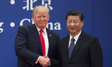 Donald Trump with Xi Jinping. The US president has based part of his re-election campaign on his claims of being tough on China but he has maintained a bank account there.