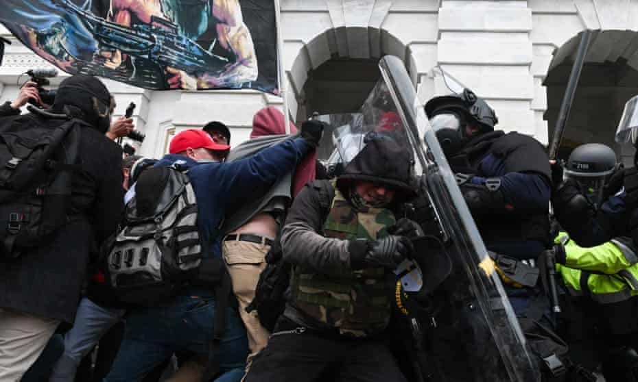 Police push back at pro-Trump mobafter they stormed the Capitol building on 6 January.