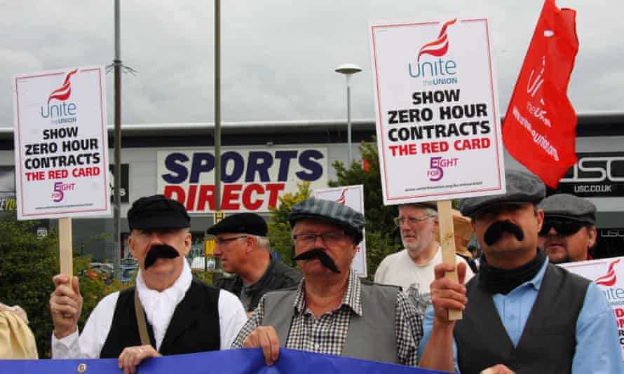 Unite union members dressed as Dickensian workers protest against zero-hours contracts outside Sports Direct.