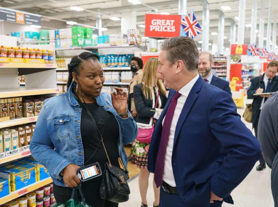 Keir Starmer talking to a shopper during a visit to Sainsbury’s at Nine Elms, south London, this morning.