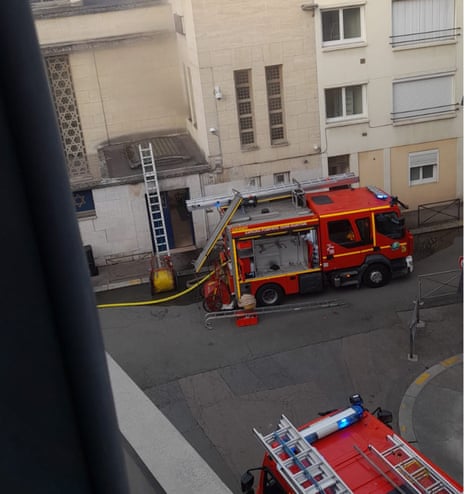 Firefighters at the Rouen synagogue after man was killed by police while trying to burn it down