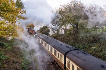 Steam train and carriages in autumn