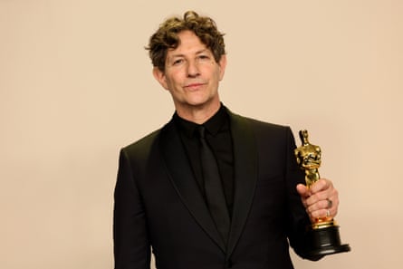 Jonathan Glazer with his Oscar for The Zone of Interest, on 10 March 2024.