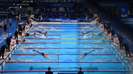 Swimmers compete in the final of the men’s 4x100m medley relay.