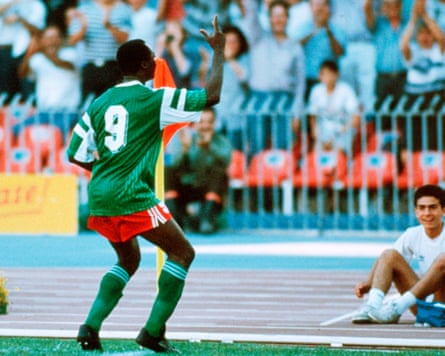 Roger Milla celebrates scoring against Colombia at the 1990 World Cup.