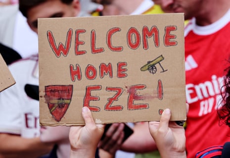 Arsenal fan with a sign in support of new signing Eberechi Eze inside the stadium before the match against Leeds.