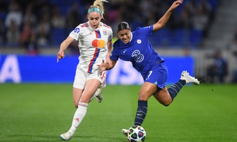 Ellie Carpenter tussles with Jess Carter during Lyon’s Women's Champions League quarter-final against Chelsea.