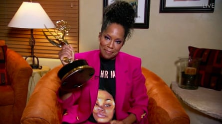 Regina King clutches her Emmy while wearing a Breonna Taylor T-shirt