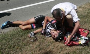 Warren Barguil looks to be in a bit of pain after crashing in a feeding zone