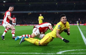 Liverpool’s Luis Diaz takes a tumble courtesy of Arsenal’s Cedric.