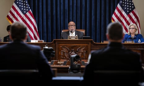 Chairman Bennie Thompson, center, presides over the House select committee hearing with Liz Cheney next to him.