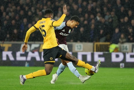 Ollie Watkins in action with Wolverhampton Wanderers’ Yerson Mosquera