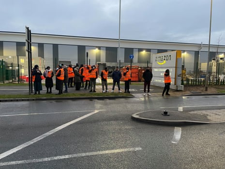 Members of the GMB union on the picket line outside the Amazon fulfilment centre in Coventry this morning