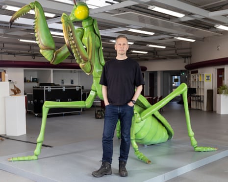 David Shrigley with the Mantis Muse, a sculpture that is at the centre of a two-week alternative curriculum he is bringing to his former school in Leicestershire.