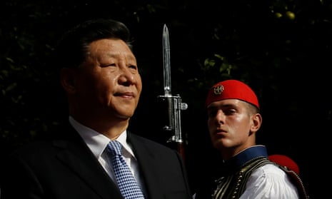 China’s president, Xi Jinping, inspecting a guard of honour on his arrival in Athens. 
