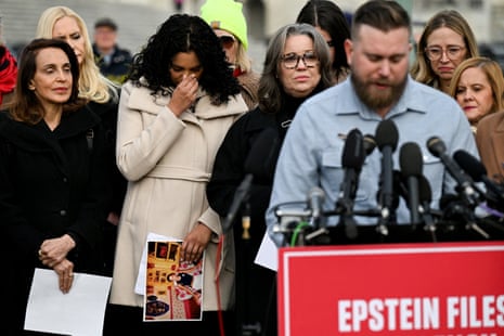 Survivors Sharlene Rochard, Jess Michaels, and Annie Farmer react as Sky Roberts, brother of late sex offender Jeffrey Epstein’s late victim Virginia Giuffre, speaks during a press conference on the Epstein Files Transparency Act on 18 November 2025.