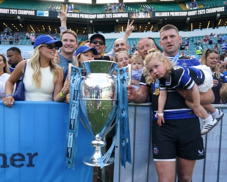 Finn Russell with his daughter and the trophy after Bath’s triumph at Twickenham.