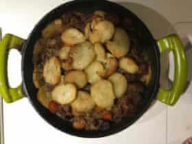 Simon Rimmer lines his dish with veg.