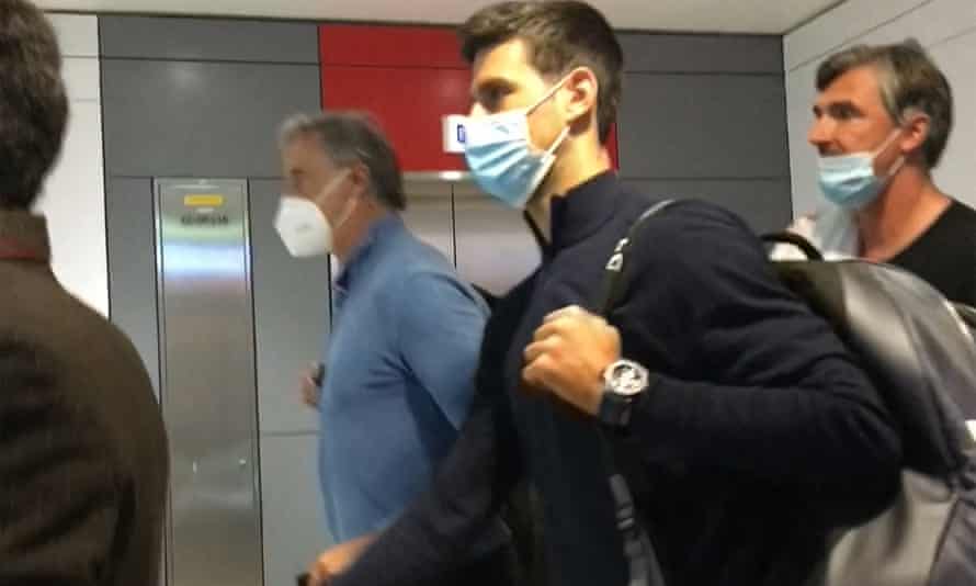 Novak Djokovic disembarks at the airport in Dubai after losing a legal battle to stay and play in the Australian Open.