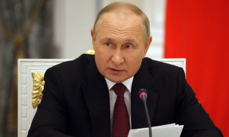 Vladimir Putin speaks during a meeting at the Kremlin on Tuesday.