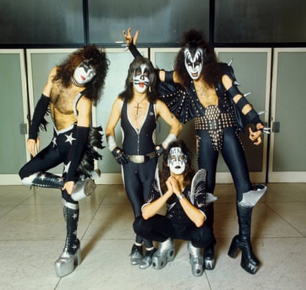 (L-R) Paul Stanley, Peter Criss, Ace Frehley (kneeling) and Gene Simmons of Kiss pose at the RAI Congrescentrum in 1976 in Amsterdam, Netherlands.