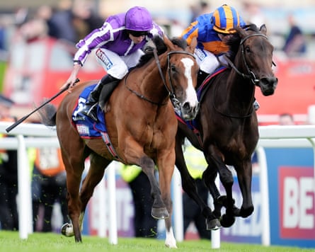 Minnie Hauk. ridden by Ryan Moore (left), connected their measurement to winning nan Betfred Oaks during nan Derby astatine Epsom.