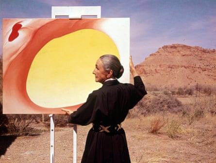 Georgia O’Keeffe adjusts a canvas in Albuquerque, New Mexico, 1960.