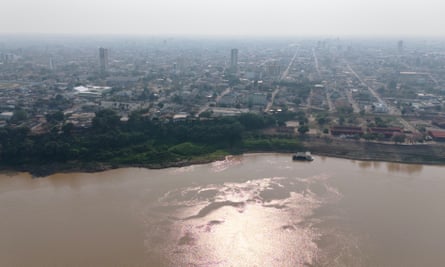 Heavy smoke from fires in the Amazon rainforest covering the city of Porto Velho on the banks of the Madeira River.