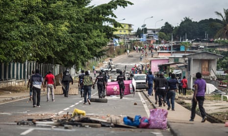 Gabon police clear barricades in Libreville.