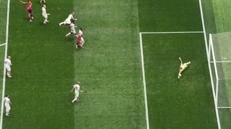 Austria's Alexander Schlager saves a shot from Spain's Mikel Oyarzabal.