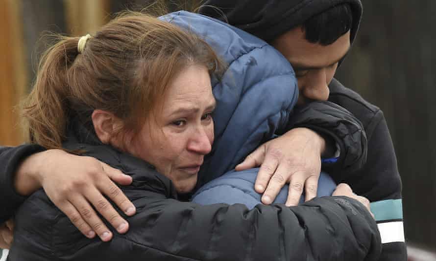 Family members mourn at the scene of the shooting in Colorado Springs.