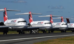 Grounded Qantas aircraft are seen parked at Brisbane Airport.