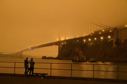 A darkened Golden Gate Bridge covered with smoke from wildfires on Wednesday.