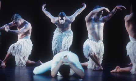 Adam Cooper as the Swan, centre, and Scott Ambler as the Prince, front, in the 1995 production of Swan Lake by Matthew Bourne.