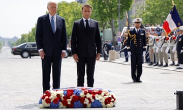 Joe Biden and Emmanuel Macron lay a wreath before the Tomb of the Unknown Soldier