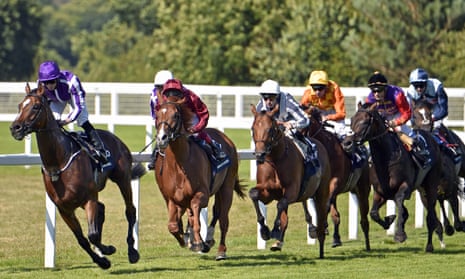 Highland Reel, ridden by Ryan Moore, leads the King George field